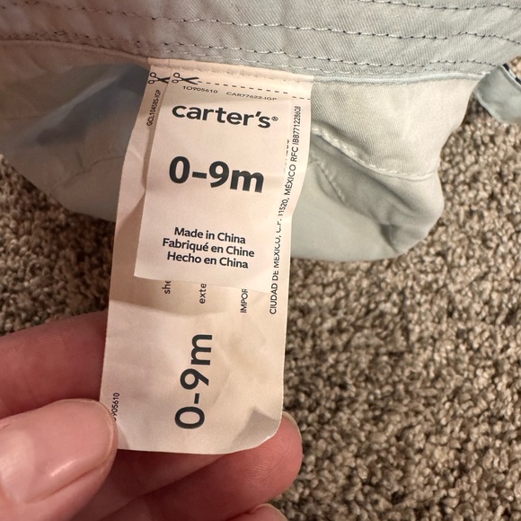 Carter’s Navy Blue Patterned Bucket Reversible sun hat for infant. - Picture 4 of 6